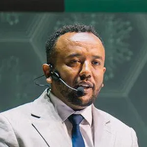 Head and shoulders photo of Abas Mohammed.